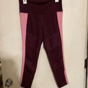 Woman’s tangerine maroon and pink leggings size medium never wore!